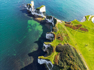 England, Beautiful aerial footage over the white cliffs, Old Harrys Rocks on the south coast of...