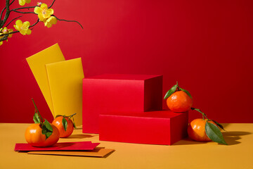 Geometric shaped podiums arranged with some tangerines and envelopes. Podium in asian new year or...