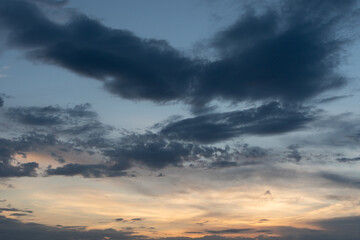 Sunset sky. View of the sun and clouds. View of the sky in the evening.