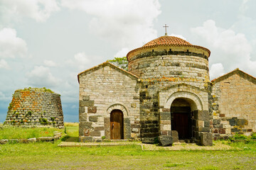 Fototapeta na wymiar Nuraghe e Chiesa di Santa Sabina. Silanus, Provincia di Nuoro, Sardegna, Italy