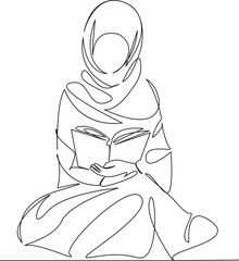 Muslim woman praying and reading the Koran