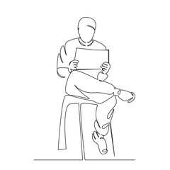 oriental man reading a newspaper