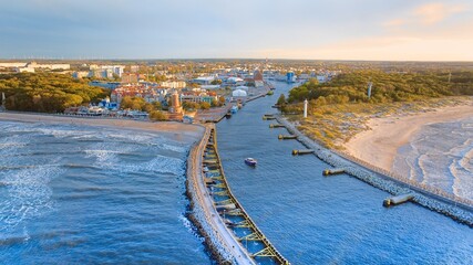 Aerial view of harbour and lighthouse in Kolobrzeg, Poland. Natural light, drone photography. - obrazy, fototapety, plakaty