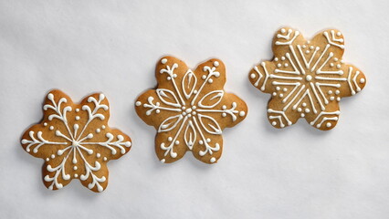 Three Snowflakes Gingerbreads. Homemade Cookie. Happy New Year Conception. Isolated on White...