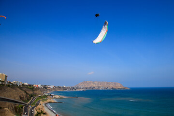 Paragliding in Miraflores is a thrilling and popular activity that allows you to soar through the skies while enjoying breathtaking views of the Pacific Ocean and the city of Lima