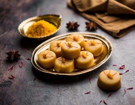 brown and kesar pedha or peda is an indian traditional sweet dish made from milk khoya and saffron