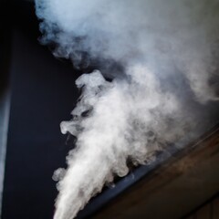 steam Smoke over black background. Fog or steam texture. Hot