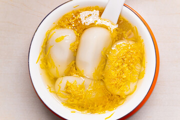 top view bowl of Chrysanthemum Glutinous Rice Balls at horizontal composition