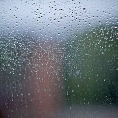 water drops on the glass wet window glass with splashes and drops of water