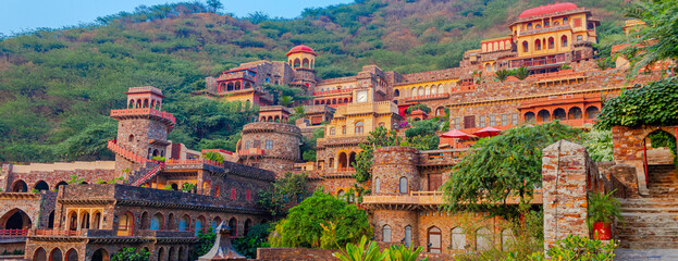 Fototapeta premium Neemrana Fort Palace - 15th century Fort located in Neemrana in Alwar Rajasthan India. Old medieval Fort-Palace built on Aravalli hills. Perfect weekend getaway from Delhi. Famous Luxury Resort India.