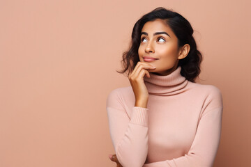 young indian woman thinking on isolated background - obrazy, fototapety, plakaty