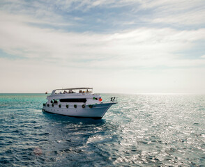 white cruise tourist boat in the Red Sea in Egypt