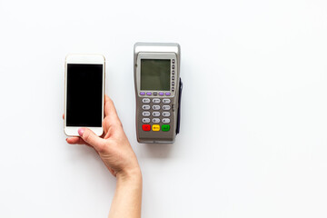 POS payment terminal reader with mobile phone. Online banking concept