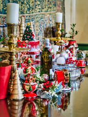 Colourful christmas decor on a glass table with blurred background, Cape Town, South Africa