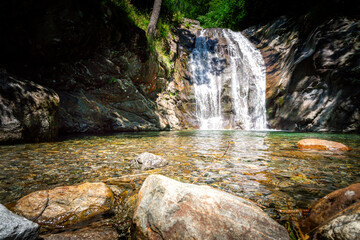 Hiking to the Kuenser Waterfalls near Meran in South Tyrol Italy.  - obrazy, fototapety, plakaty