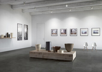Huge workplace of the head with a white computer, a classic leather armchair, a wooden office table, a grey sofa and black coffee table in the waiting room. 3D Rendering