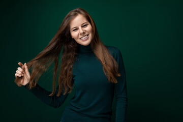 30 year old pretty European woman let down her brown hair