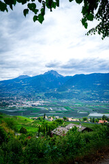 Hiking along the Marlinger Waalweg near Meran in South Tyrol Italy. With some Views over wineyards,...