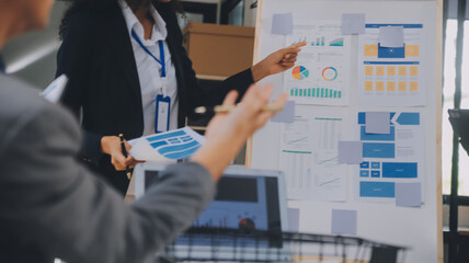 Close up ux developer and ui designer use augmented reality brainstorming about mobile app interface wireframe design on desk at modern office.Creative digital development agency