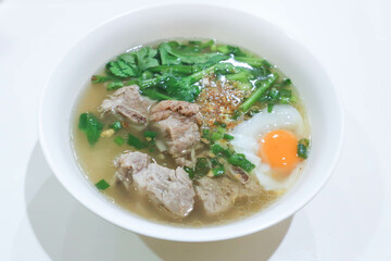 pork soup or pork rib soup with egg and vegetable or boiled rice with pork or boiled rice soup and egg