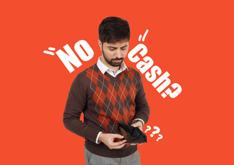 Young Man with Empty Wallet on Red Background with No Cash. Unhappy Indian guy looking into empty...