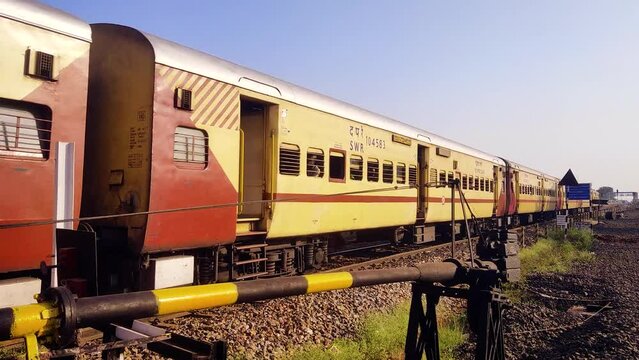 "Badami,India-30th October 2022:Indian express train passing through railway tracks"