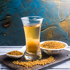 fenugreek seeds or methi dana drink by soaking it in water overnight - obrazy, fototapety, plakaty