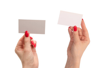 Empty card in woman hand with red nails  isolated on a white background.