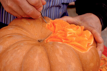 A pumpkin artist in action