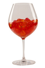 Sweet fruit jelly dessert in a glass isolated on a white background.