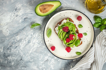 Healthy avocado toasts for breakfast or lunch. Vegetarian food. Vegan menu. Restaurant menu, dieting, cookbook recipe top view