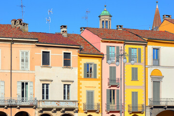 palazzi storici colorati su piazza vittoria di lodi in italia, colorful historical buildings on piazza vittoria in lodi city in italy 