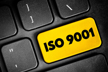 ISO 9001 - international standard that specifies requirements for a quality management system, text concept button on keyboard - obrazy, fototapety, plakaty