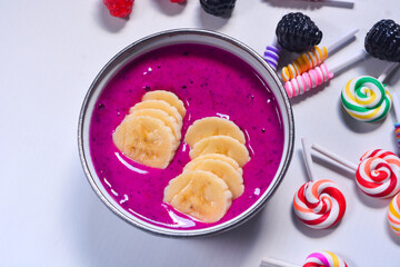 Superfood healthy food for a diet from dragon fruit, strawberries, bananas and honey