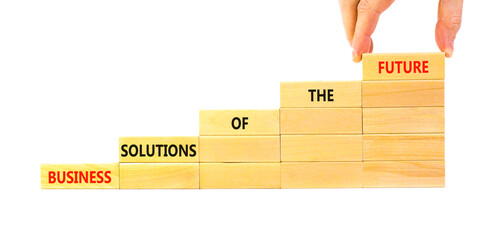 Business solutions of the future symbol. Concept words Business solutions of the future on wooden blocks. Beautiful white table white background. Business solutions of the future concept. Copy space.