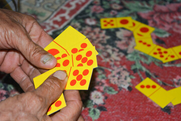 Playing card games, a gambling game played by some people