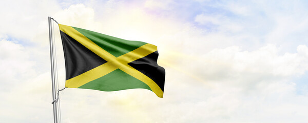 Jamaica flag waving on sky background. 3D Rendering