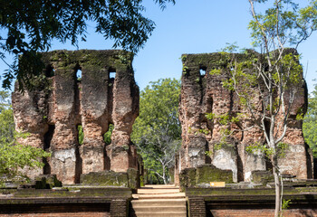 Ruins between the green in the ancient city of Polonaruwa, Sri Lanka