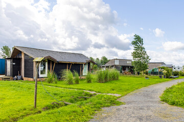 Ten Boer, The Netherlands - August 8, 2023: Tiny house area Woldwijk in Ten Boer municipality...