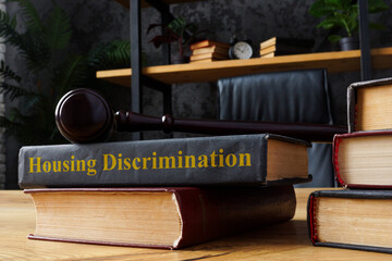 Book with housing discrimination law and gavel. - obrazy, fototapety, plakaty
