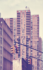 Manhattan cityscape with residential skyscrapers, color toning applied, New York City, USA.