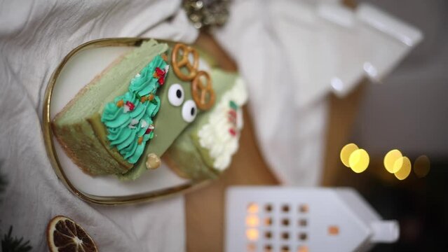 Vertical video. Cute Christmas cheesecakes. Sweet home made Festive Christmas cheesecake. Christmas new year decorations, dessert holiday food.