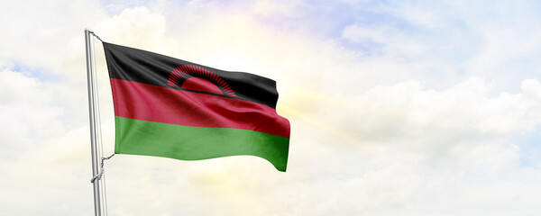 Malawi flag waving on sky background. 3D Rendering