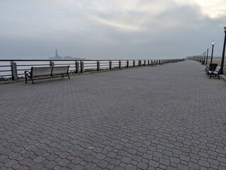 pathway in Liberty State Park looking at the statue of Liberty