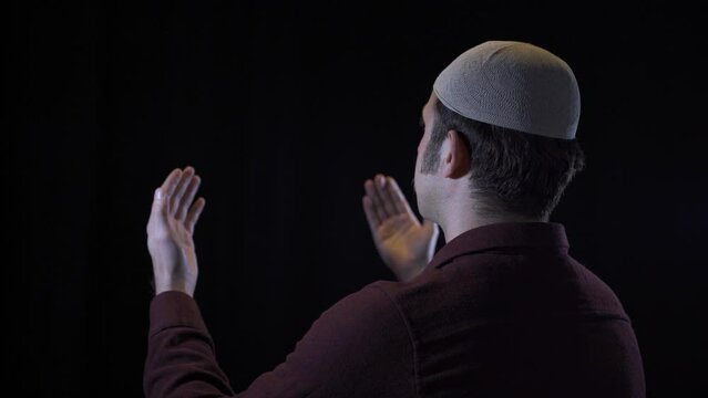 Muslim man praying.