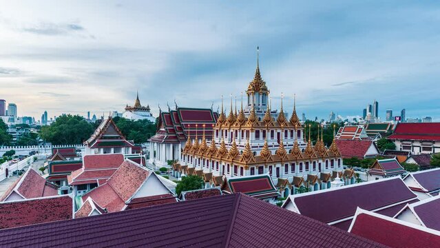 Golden metal castle illuminated, Wat Ratchanatdaram Woravihara, Loha Prasat temple in the morning at Bangkok