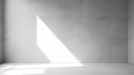 Minimal abstract light gray background for product display. Shadow and light from window on plaster wall.
