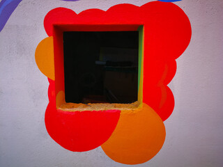 Background with window on multicolored wall