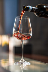 Wine pouring into glass