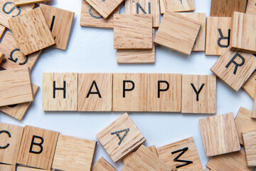 wood blocks with word happy